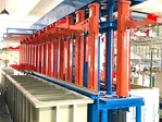 Vertical lifting station above electroplating process tanks