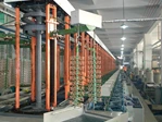 Enclosed transfer aisle of a circular vertical lifting plating line