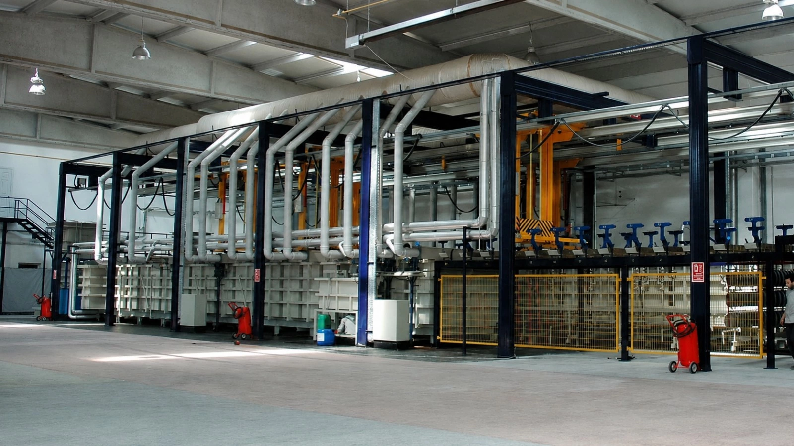 Automatic electroplating line with workshop exhaust and utility piping