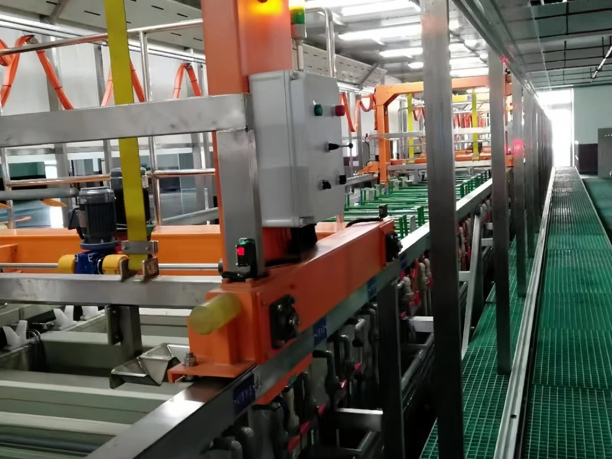 Gantry hoist with local controls above electroplating process tanks